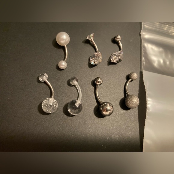 Belly button rings. Set of 7. Brand new in package. See pictures for all detail - Picture 2 of 3